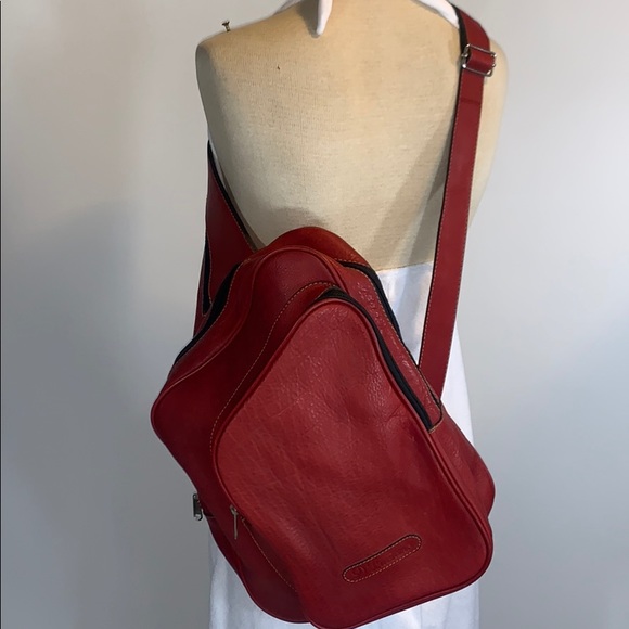 red leather sling bag